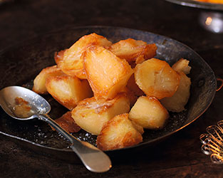 Heston's herb roast potatoes