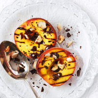 Griddled peaches with hazelhuts and melting chocolate