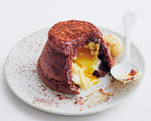 Gooey chocolate orange puddings with a 'Cream Egg' filling