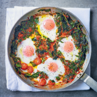 Baked eggs with spinach, tomato, red pepper & chorizo sauce