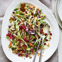 Cabbage, apple and carrot slaw with pecans and pomegranate
