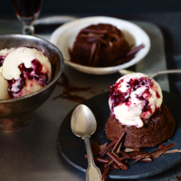 Flourless chocolate cakes with crème fraîche and cranberry ripple ice cream