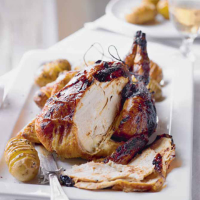Ginger glazed roast chicken with hasselback potatoes