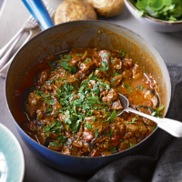 Lamb, tomato and anchovy casserole with cumin aubergines