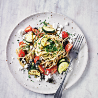 Mediterranean spaghetti salad in avocado chive dressing