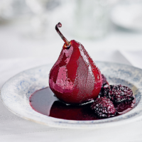 Pears in blackberry & red wine sauce