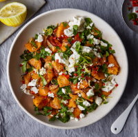 Smashed swede with feta, chilli and parsley