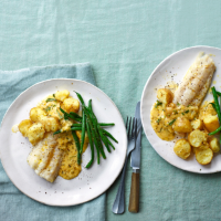Tom Brown's Roast hake with chicken butter sauce and crushed new potatoes