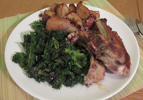 Lamb cutlets with kale and herby roast potatoes