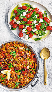 Tomato and mozzarella salad, and smoky paella