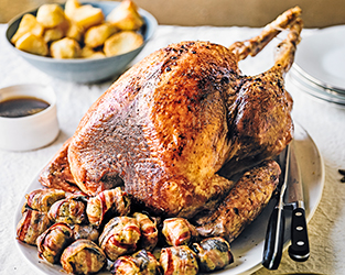 Maple butter glazed turkey with pancetta parcels