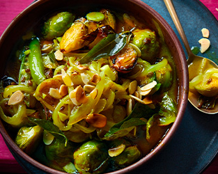 Charred Brussels sprouts drizzled with kiri hodi