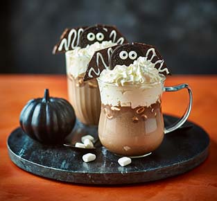 Peppermint hot chocolate with mint-choc cookie bats