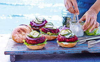 Beetroot burgers with soused cucumbers, soured cream & dill 