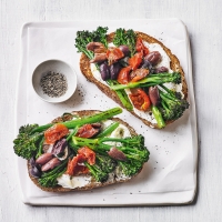 Charred Tenderstem, tomato, olive & soft cheese toasts
