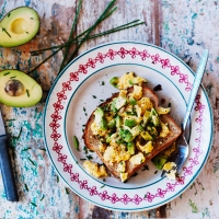 LOVE life scrambled eggs and avocado served with seeded toast