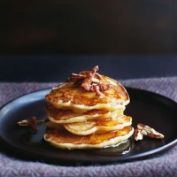 Pear and buttermilk pancakes with maple syrup