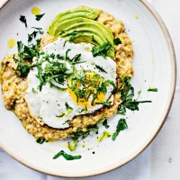 Quick red lentil dhal with fried egg, avocado & herbs