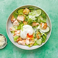 Salmon Caesar salad with poached eggs