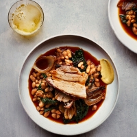Slow-roasted pork belly with cannellini beans