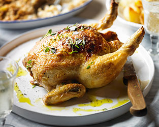 Roast chicken with apple stuffing