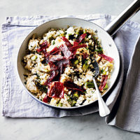 Asparagus & goat’s cheese risotto with Ibérico ham crisps