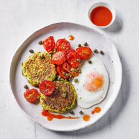 Courgette fritters, roasted tomatoes & eggs