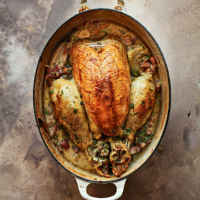 Pot-roast chicken with bacon, cider & caramelised shallots