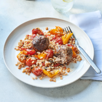 Veal meatballs with pepperonata and farro
