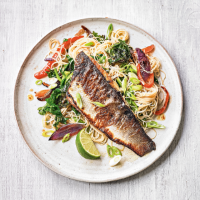 Wholegrain vegetable noodle stir fry with grilled sea bass