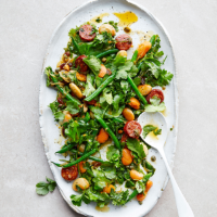 Warm herb salad with chorizo & butter beans
