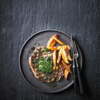 Rib eye steak with tarragon, parsley & garlic butter